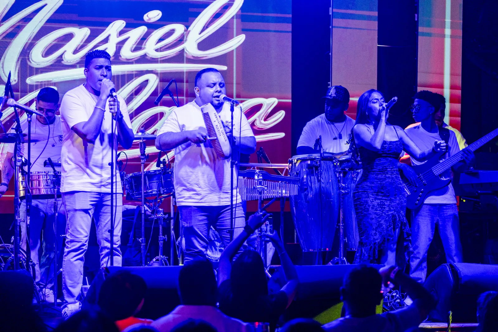 Band performing on stage at a LIVEST show.