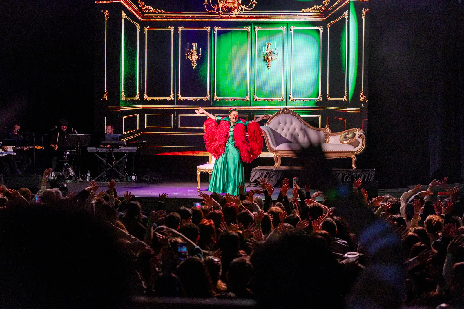Venue interior lit in green ahead of a LIVEST show.